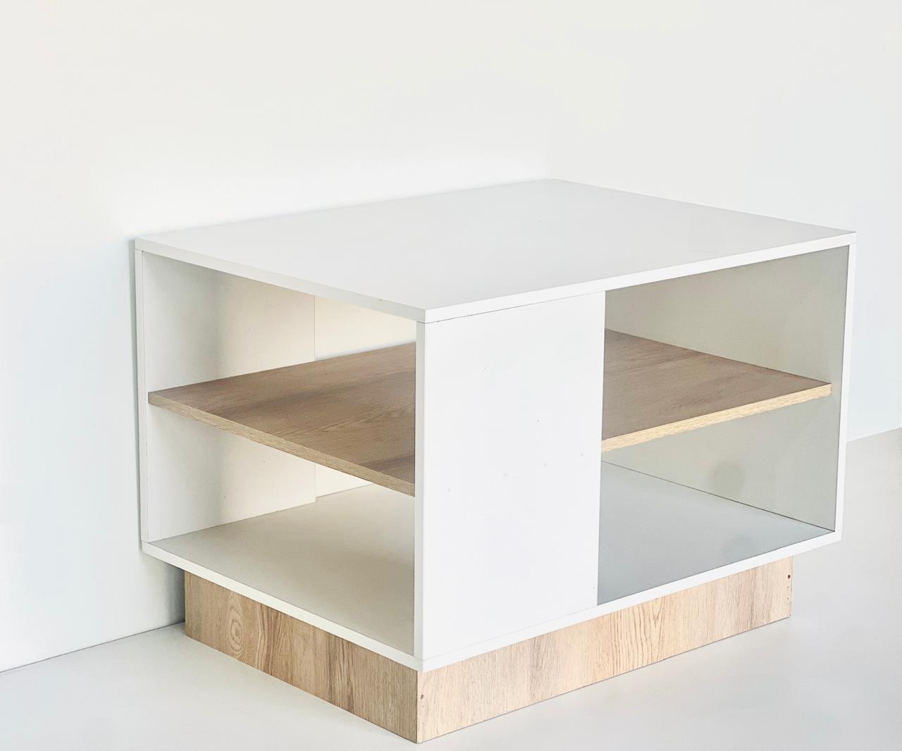 White and wood cube shelf on a white background